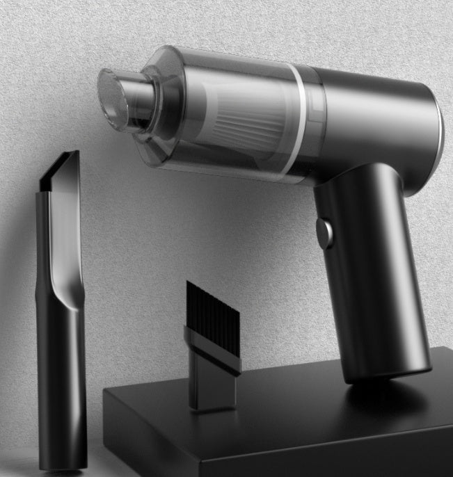 Black KZ Cordless Car Vacuum with the crevice nozzle attached